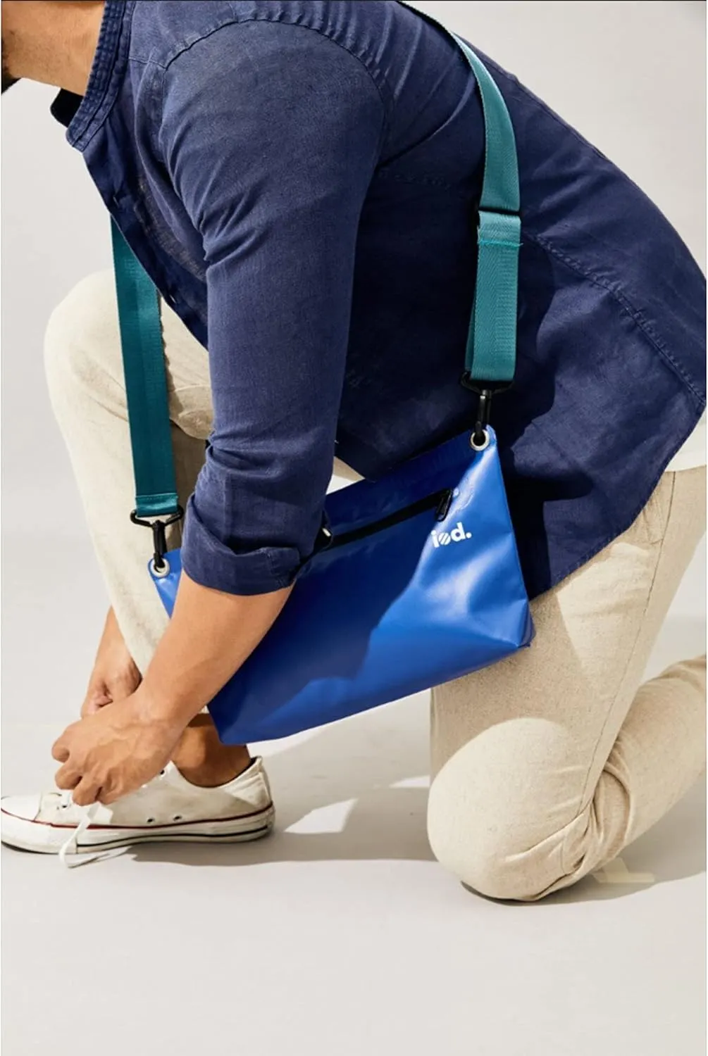 iod Weatherproof Sling Bag/Crossbody Bag with Water-Resistant Zipper - Tarpaulin Bag with Adjustable Shoulder Straps (White, M)