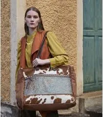 Myra Juniper Canvas and Hair on Weekender Bag