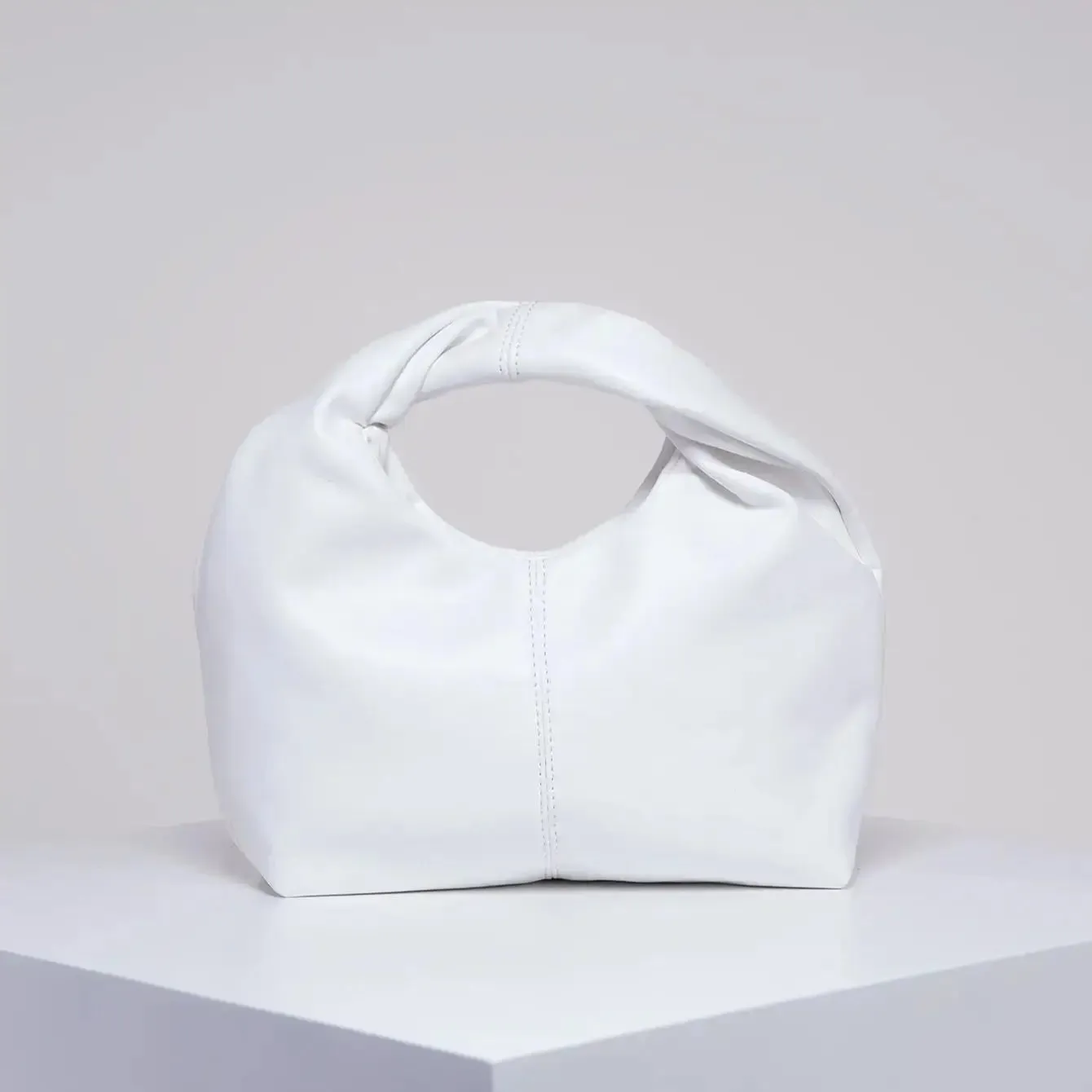 Stylish twist square bag, solid color top clutch bag, simple and versatile commut